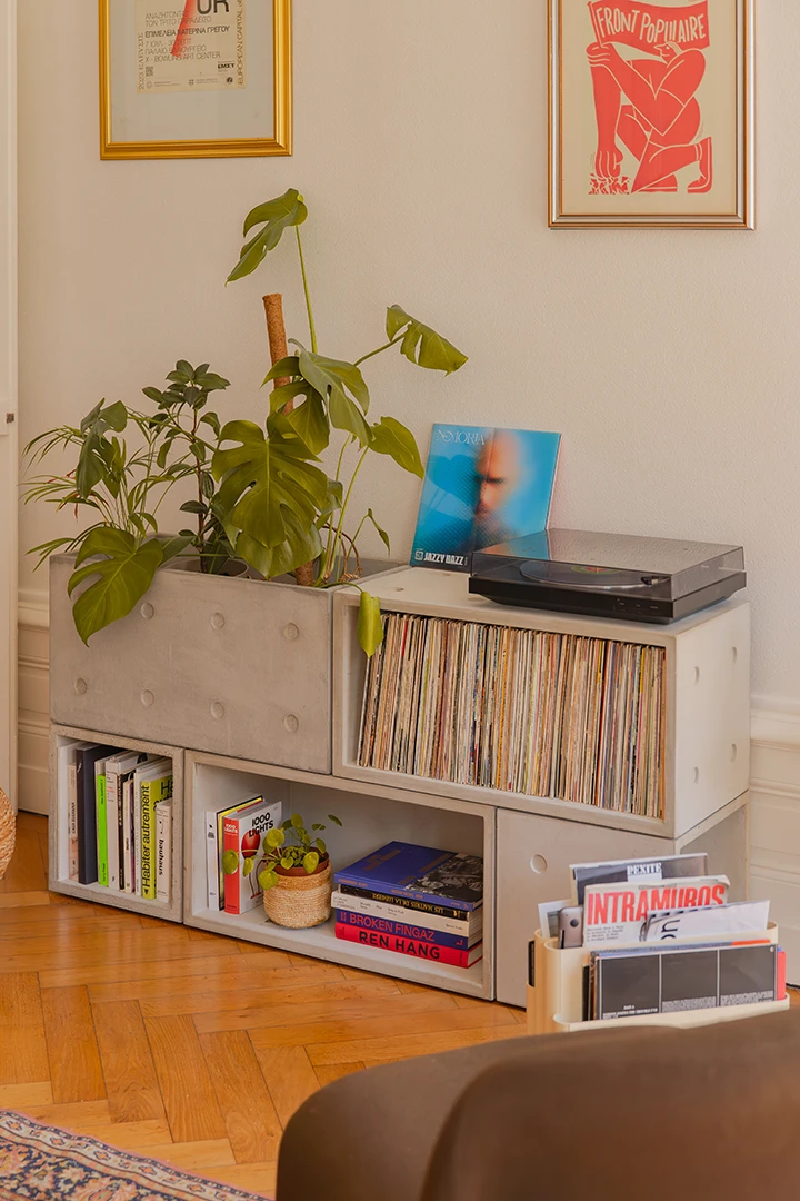 Our concrete storage system full of vinyl records , books and plants